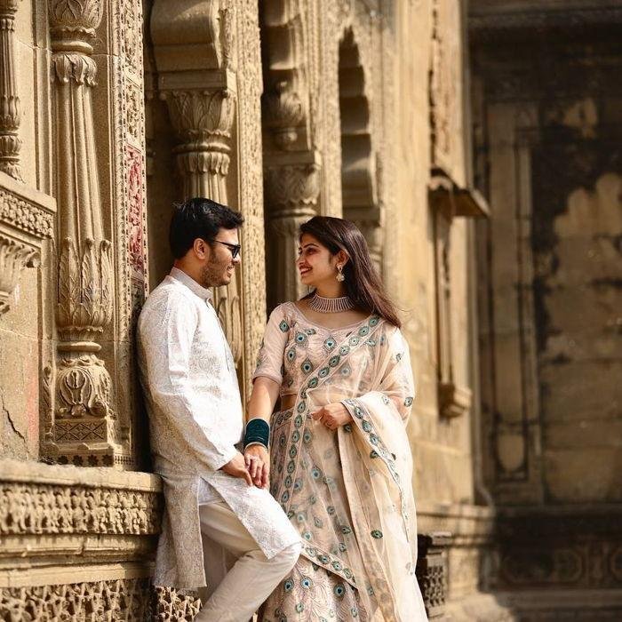 Pre-Wedding Photography Ideas featuring an Indian couple in traditional outfits