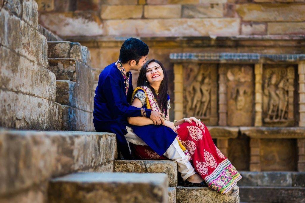 Pre-Wedding Photography Ideas capturing a candid moment between an Indian couple
