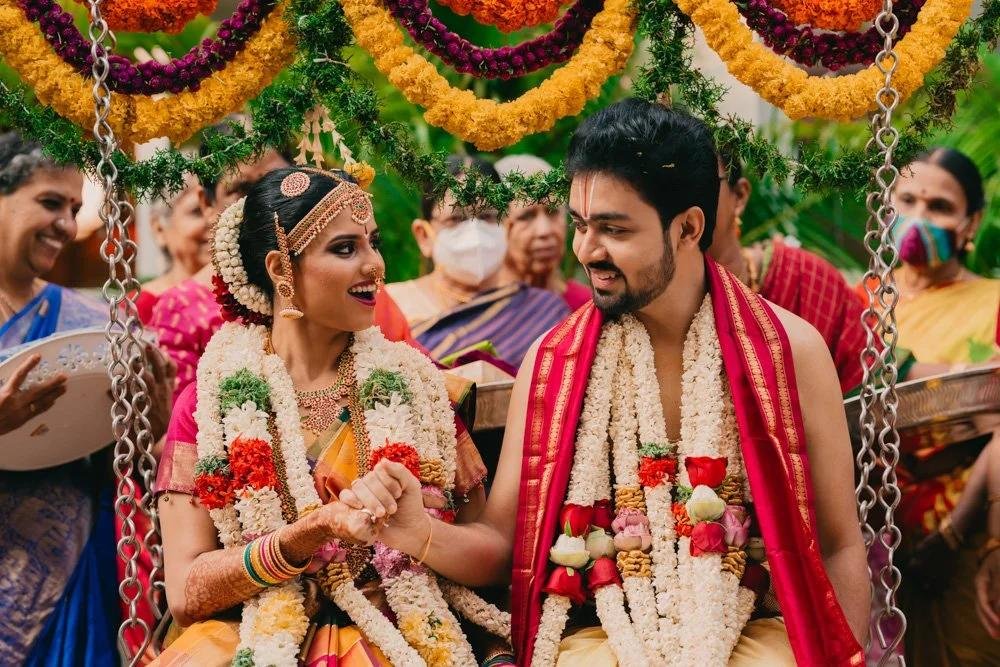 candid family moment at South Indian wedding photographer in Anantapur